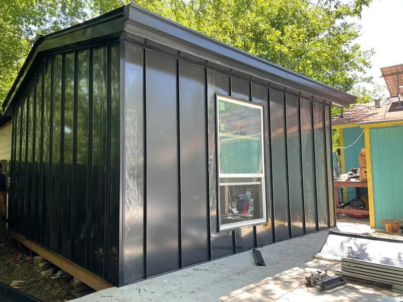 Black standing seam metal wall panels for Metal Roof Installation in Enfield